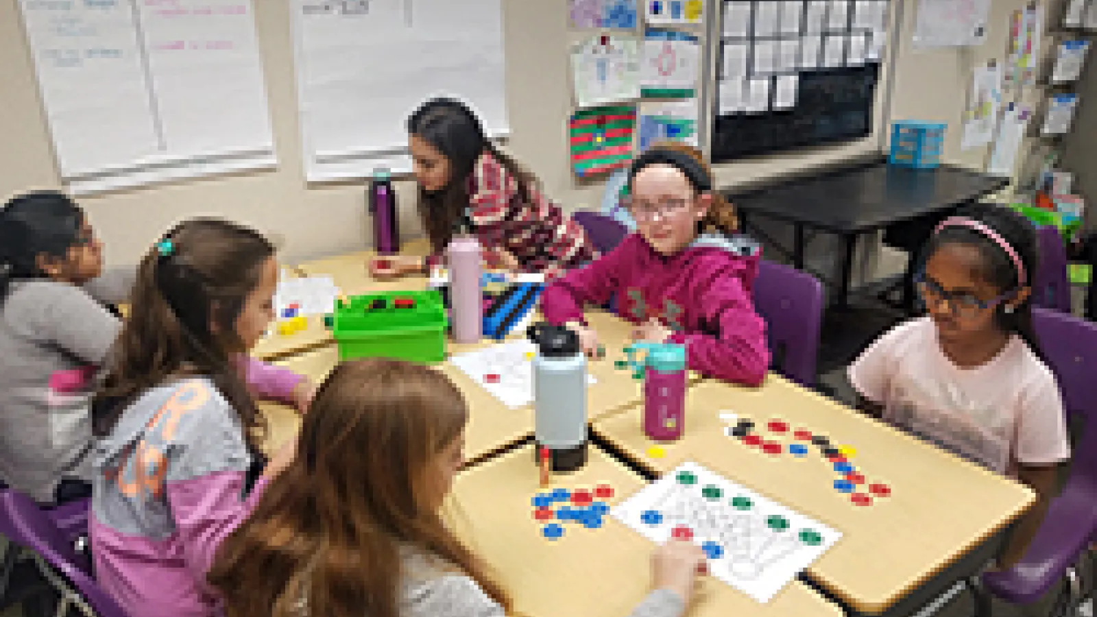 Students playing games on graphs.