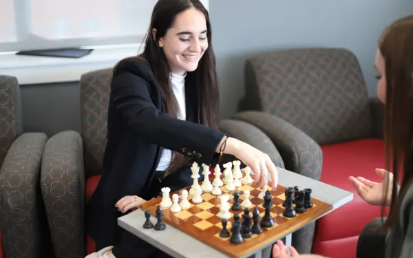 Student playing chess