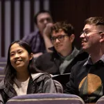 students watching ceremony