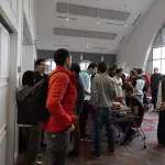 students and faculty talking