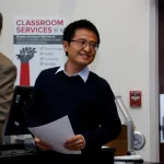student receiving certificate