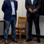 two faculty members