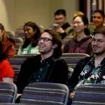 students watching ceremony