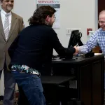 student receiving certificate