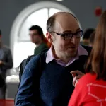 students and faculty talking