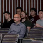 Students and professors sitting