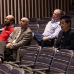 faculty watching ceremony