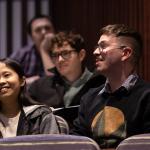 students watching ceremony