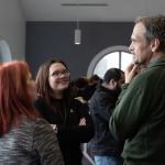 student and faculty talking