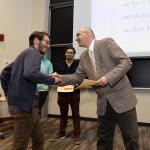 student receiving certificate