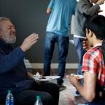 student and faculty talking