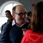 students and faculty talking