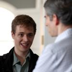 Professor and student talking