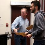 Student receiving award