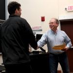 Student receiving award