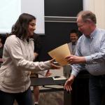 Student receiving award